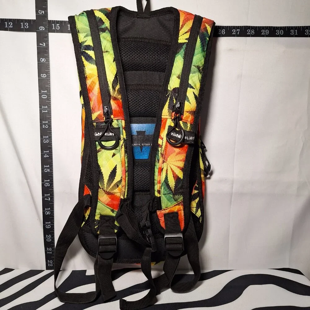 Vibedration Hydration Backpack w/o bladder - green, orange, black leaves - used